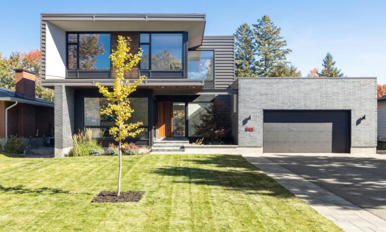 a house with a tree in the front yard